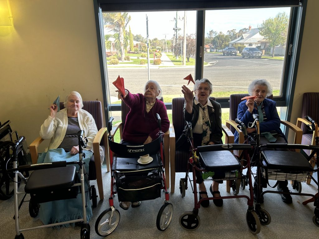 Avonlea residents with paper planes